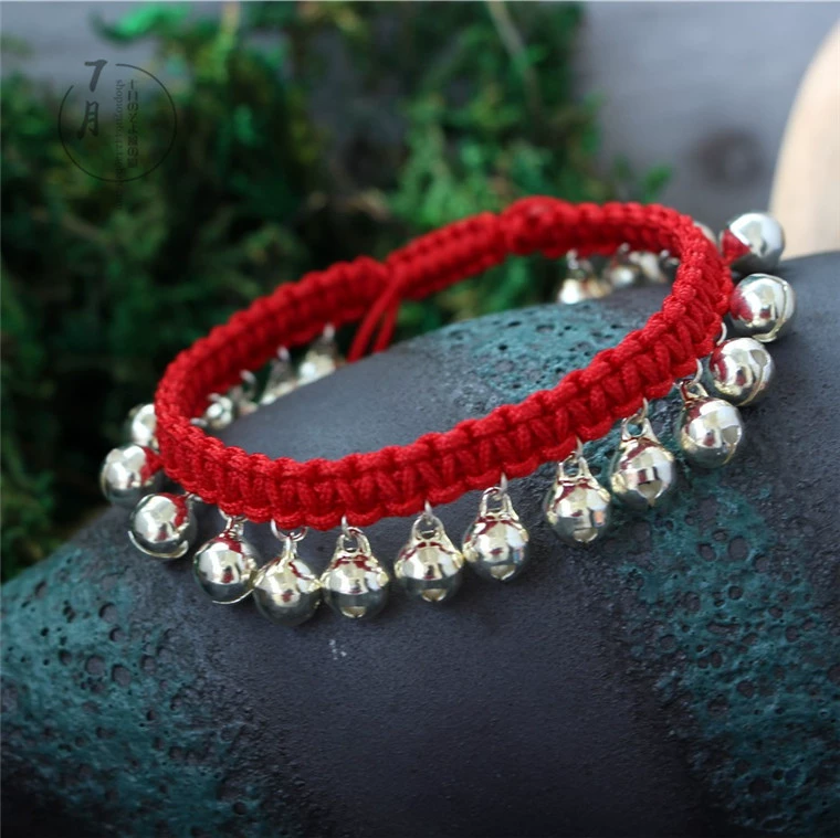 Vòng tay trang sức dân tộc đan vòng tay năm nay vòng tay chuông đỏ lắc chân nữ titan