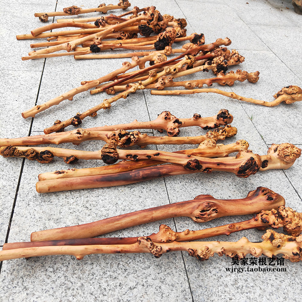 Yunnan black fruit wood knocking back stick tree tumor to play knotty wood handle piece longevity wood massage stick shancha wood back hammer