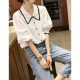 Doll collar lantern sleeve shirt women 2023 spring and summer new design sense niche loose French chic top