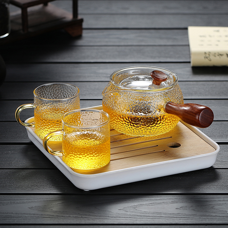 Side put glass teapot household high temperature resistant filter tea pot flower tea pot black crystal stove cooking teapot tea tea tea set group