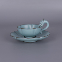 Song Dynasty Ru kiln iron body branch nail dragon handle tea cup with holder antique porcelain toy Dong five famous kiln ornaments collection