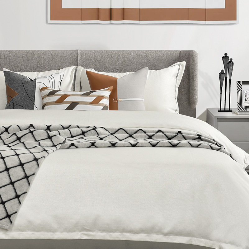 Modern rice white orange coffee color exhibition hall model room bedding light luxury soft decoration model room bedding pillows and blankets