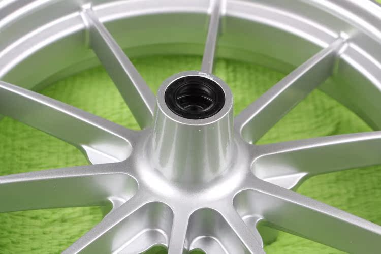 Năm lỗ rpm bánh trước 12-inch xe máy bánh xe phía trước hub xe máy điện sửa đổi Linhai Aurora trận ba thế hệ của mắt để đi xe BWS vành xe honda future
