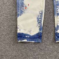 百搭时尚油漆泼墨纽扣高弹修身长裤牛仔裤