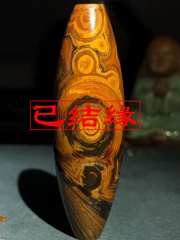 Red Buddha totem Eye-filled Tianzhu Nine-eyed stone Pebble Meng Tianzhu Tianan Agate Natural Tianzhu Pendant Genuine Tibet