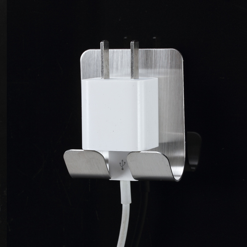 Plug hook free of punch power cord to contain the adhesive hook plug holder wall-mounted adhesive powerful plug holder
