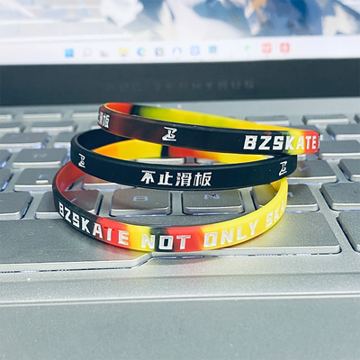 Not only the silicone thin wristband for skateboards, but also the original sports skateboard long wristband for boys, girls and children are available in two colors
