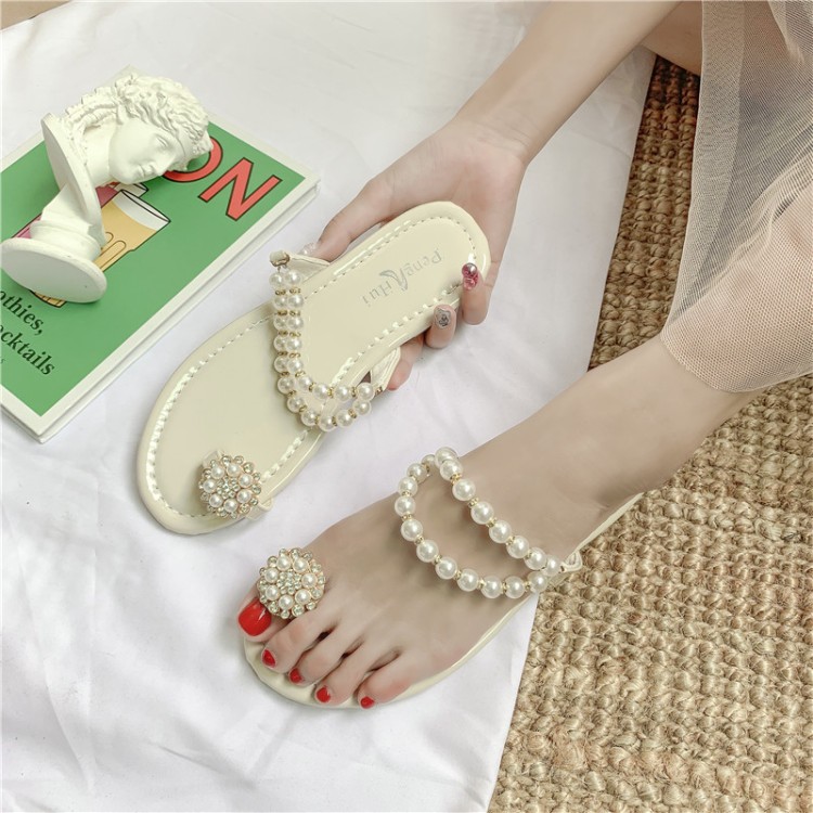 Net red slippers female summer wear 2022 new Korean version all-match pearl set-toe flat bottom ins tide beach sandals and slippers