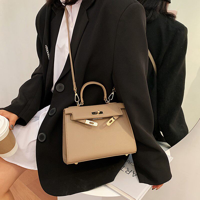 Korean generation high-end bag women's bag new 22 net red fashion hand-held Kelly bag all-match single shoulder Messenger mobile phone bag