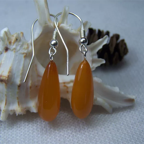 Organic amber earrings wax agate drop-shaped, silver 925 sample