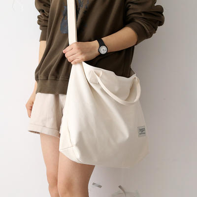 NR Versatile solid color single-shoulder crossbody bag for women, new 2025 college student tutorial backpack, schoolbag, large canvas bag