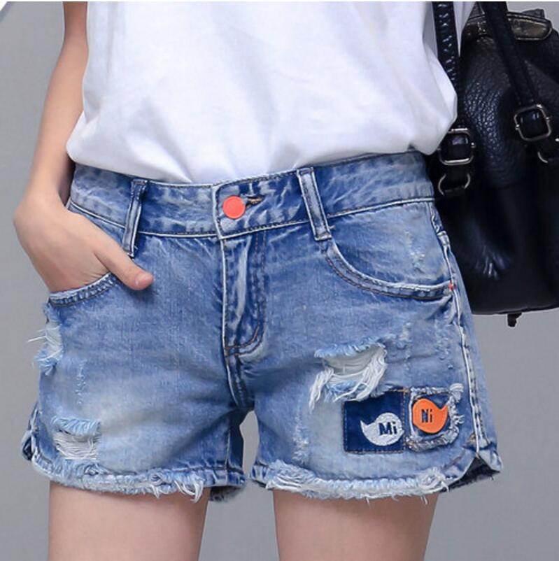 Nhà máy trực tiếp lây lan nguồn cung cấp bán buôn phụ nữ quần short denim mùa hè quần jean của phụ nữ quần short kích thước lớn jeans quần bò rách nữ