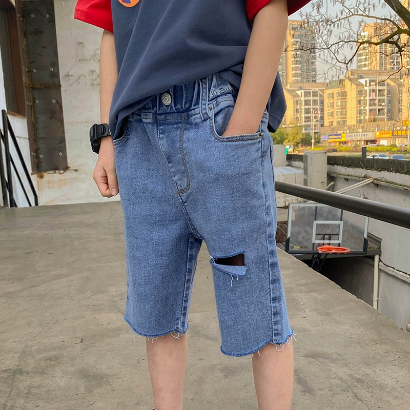 Bé trai quần short denim quần áo mùa hè đẹp trai phần mỏng quần năm điểm của trẻ em kéo dài mùa hè rách quần ống túm bé trai thủy triều - Quần jean