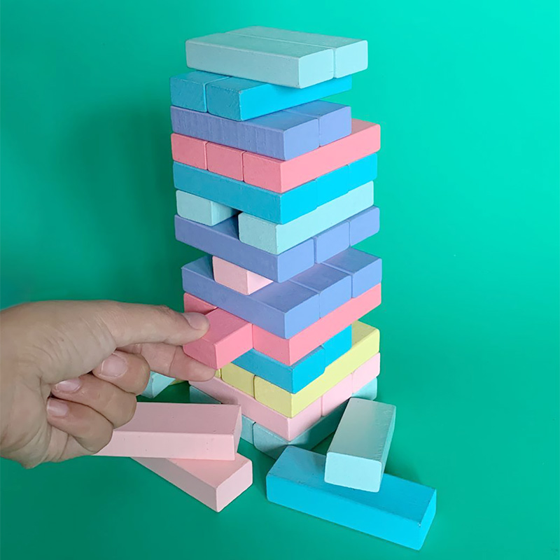 Stack of stacks Leasing building blocks Stacked Towers Layers Stacked High Pumping Building Blocks Head Adults Play Children Puzzle Table Tours Playful