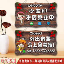 Welcome to the door of the store. Double-sided creative shopkeeper who is in business has something to go out to order the sign.