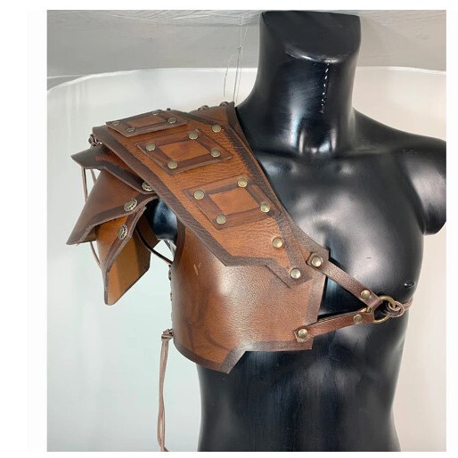European and American Circular Stage Props Rivet Armor Sports Outdoor Protective Gear Shoulder Pads Leather Armor. European and American Circular Stage Props Rivet Armor Sports Outdoor Protective Gear Shoulder Pads Leather Armor.