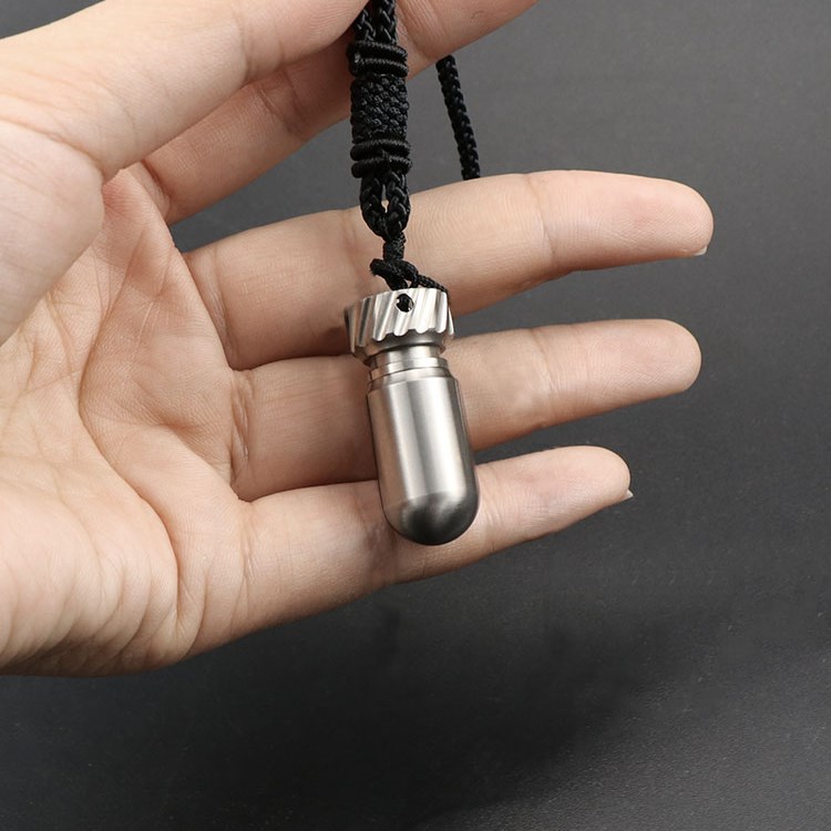 Pure titanium mini pendant medicine box portable first aid medicine standing keychain medicine box sealed waterproof small medicine bottle