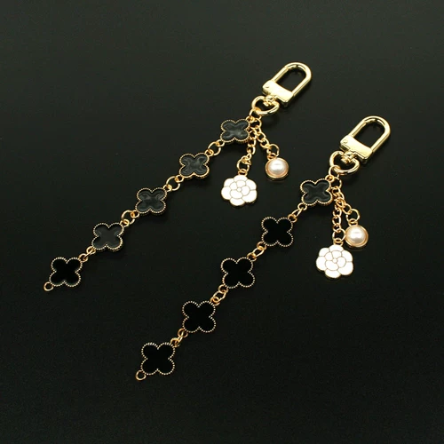 Подвеска, золотая металлическая небольшая сумка, четырехлистный клевер