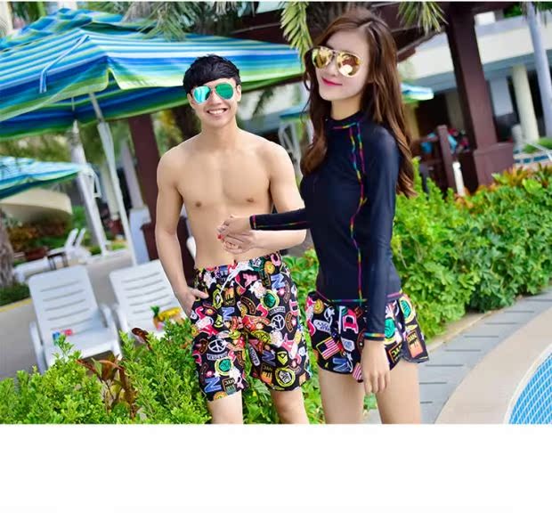 Cặp đôi đi biển mùa hè rộng kích thước lớn năm điểm trong quần hoa nam và nữ quần ngắn thủy triều Áo thun đi biển thể thao ngày lễ - Quần bãi biển quần áo đi biển nữ