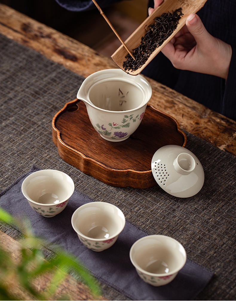 Receive a travel bag portable kung fu tea set of jingdezhen ceramic crack a pot of three small set on a business trip