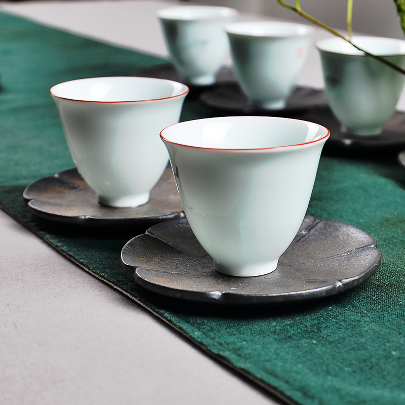 Wynn hui ceramic cups supporting up coarse pottery glaze creative kung fu tea cup pad metal tea tea taking of spare parts