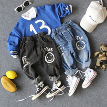 Korean version of childrens pants spring autumn season new children smiley face graffiti jeans boy casual 100 hitch pants tide