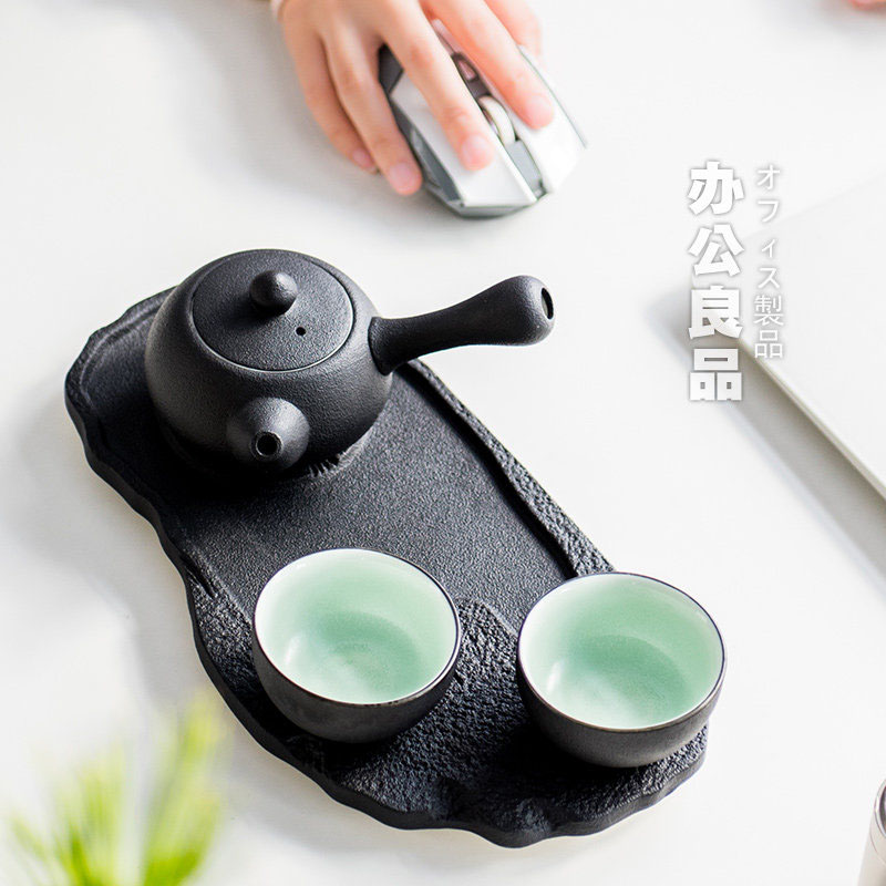 British green side between ink pot of Japanese kung fu tea set ceramic teapot set with a pot of tea tray two cups