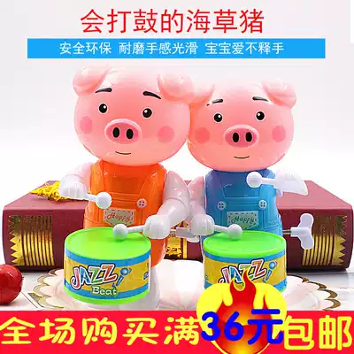 Winding drumming pig drumming toy clockwork small toy Children's musical concept High-age drawing board rack