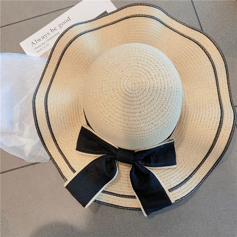 Women's Simple Style Bow Knot Big Eaves Straw Hat display picture 10