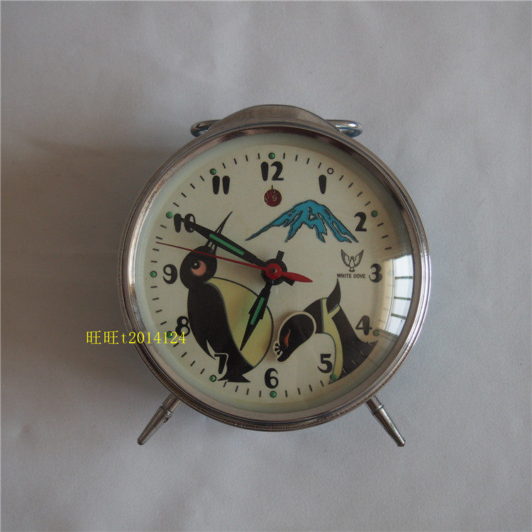 White Dove Card Penguin Monster Mechanical Alarm Clock Horseshoe Table Monster head will move