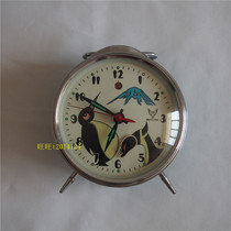 Pigeon brand penguin monster mechanical alarm clock Horseshoe watch monster head will move