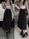 Irregular and versatile A-line asymmetric mid-length skirt for women