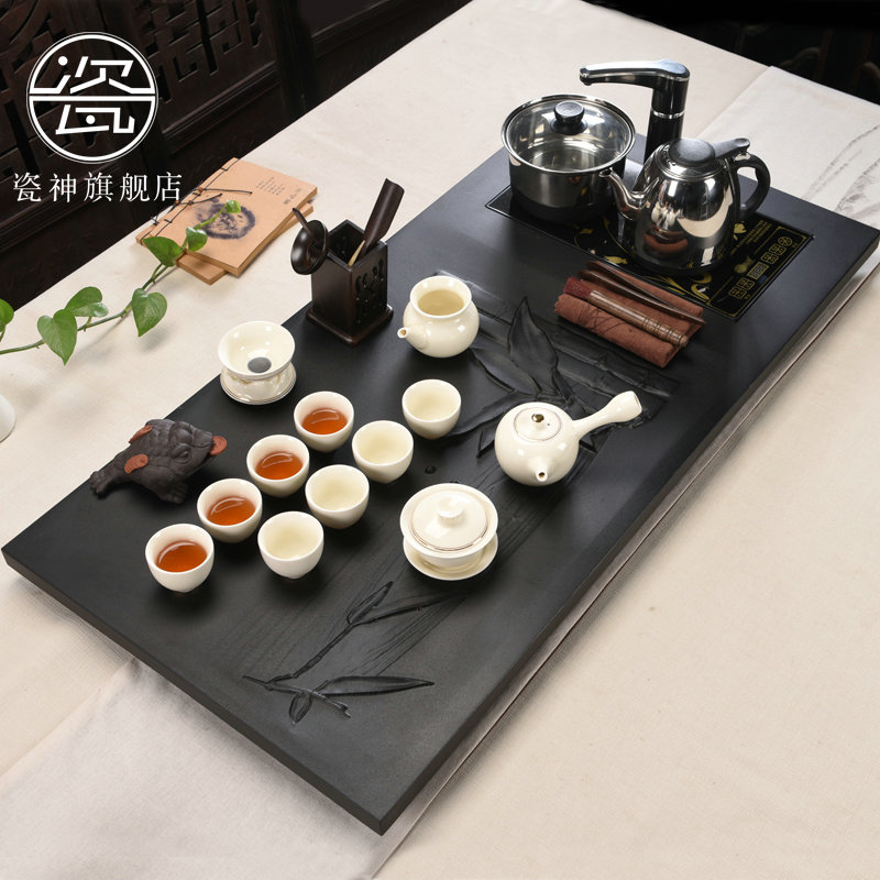 Porcelain god black stone tea suit household ceramic tea sets tea sea induction cooker sharply large stone, stone tea tray