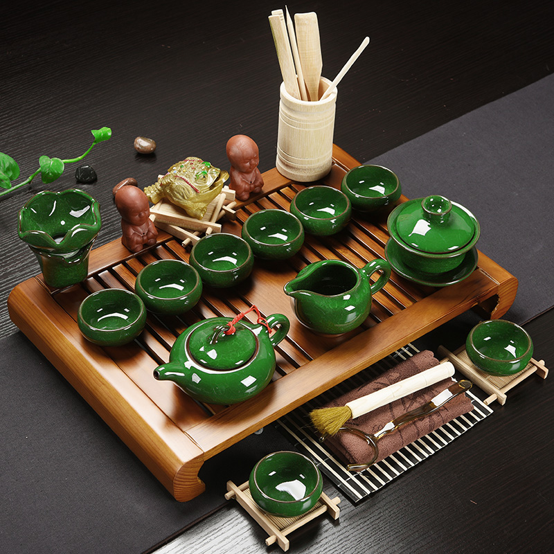 Porcelain god solid wood tea tray of a complete set of kung fu tea set drainage water the draw - out type tea table with beverage holder tray was home