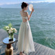 French white sling backless a-line dress female summer high-end sweet Sanya seaside holiday fairy skirt