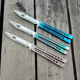 One-piece butterfly knife with die-cast handle