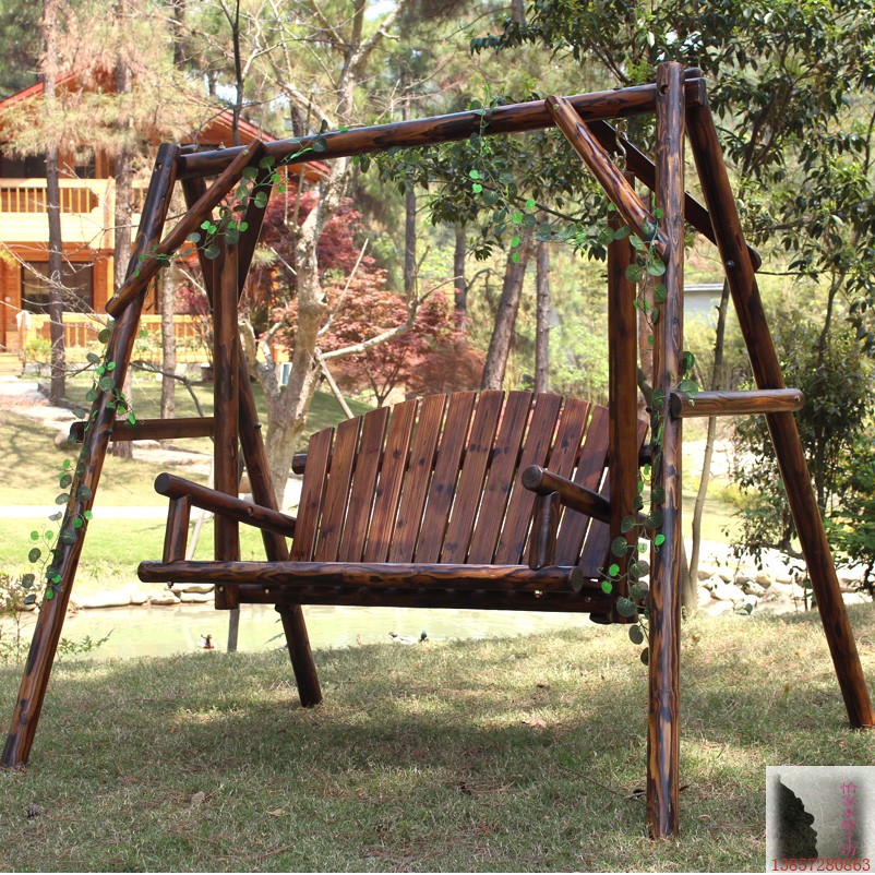 Preservative wood pure solid wood outdoor wood swing wood Qianqiu hanging chair wood chair carbonization carbonized wood chair swing rocking chair