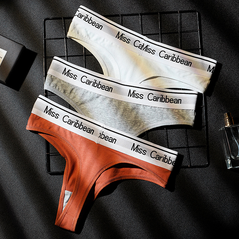tback female Tiny pants sexy sports fitness European and American honey peach hip low waist ice silk female t type underwear without mark pure cotton
