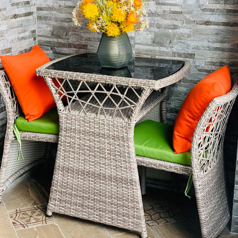 Balcony rattan chair Three-piece outdoor garden woven rattan table and chair combination Leisure open-air balcony small coffee table Creative rattan chair