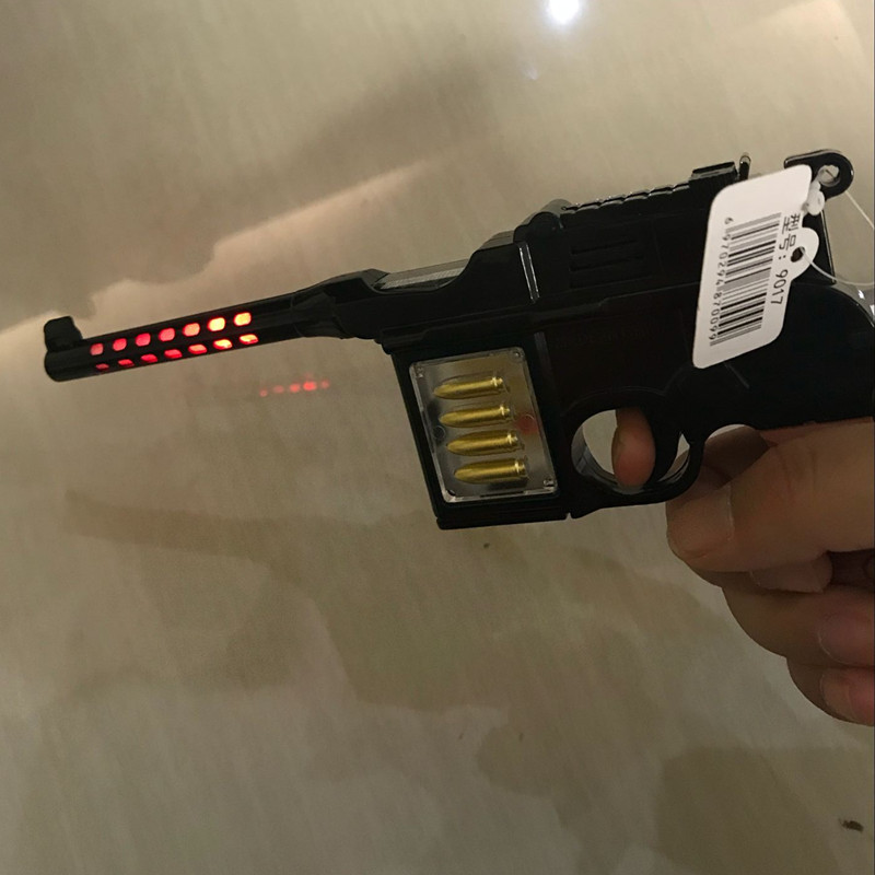 Mini Police Projection Súng điện Âm thanh và Light Boy Puzzle Falling Đồ chơi trẻ em Súng khủng long biến dạng đồ chơi trẻ em