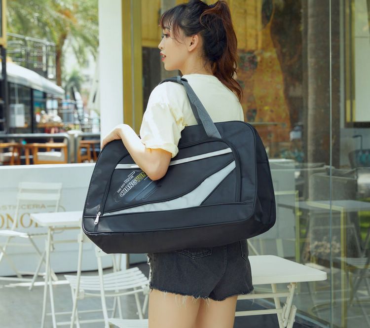 Phiên bản Hàn Quốc của túi hành lý vải Oxford dung tích lớn túi duffel nhẹ đi khoảng cách ngắn Túi du lịch nữ xách tay đơn giản chống thấm nước - Túi du lịch