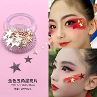 Золотые звезды с клеем и пинцетом