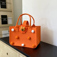 Толстый оранжевый шар для волос