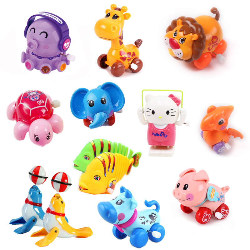 The 0-3-6-year-old baby boy girl who will climb up the fun Puzzle Clockwork Toy with a small animal will run