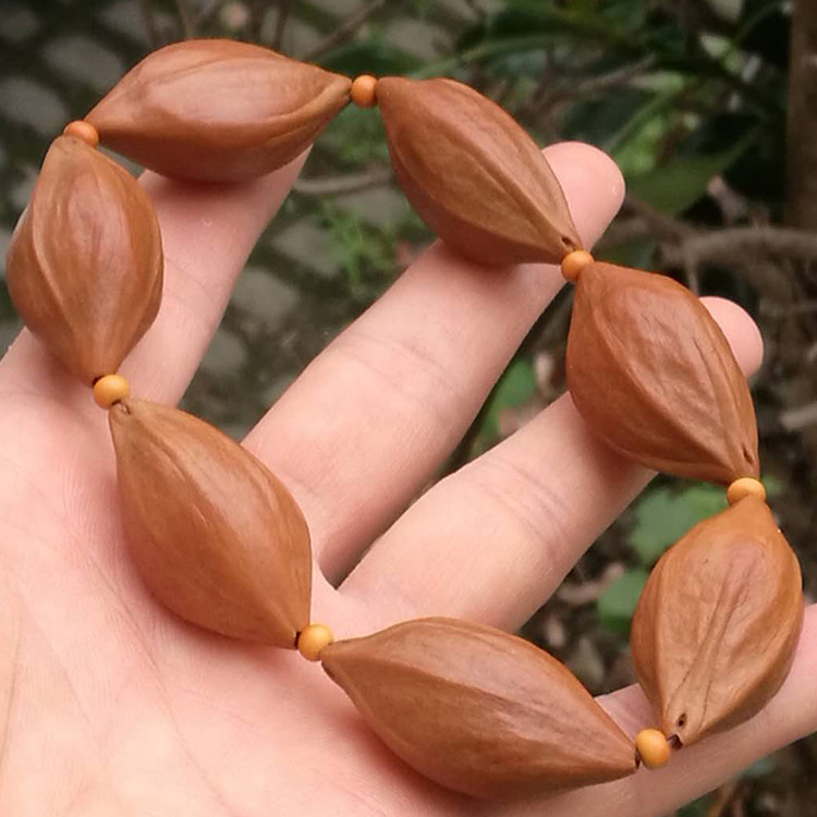 Olive kernel raw material original seed original skin bracelet has been whitelized Merlin triangle core peelogen core diameter 1 9 bracelet