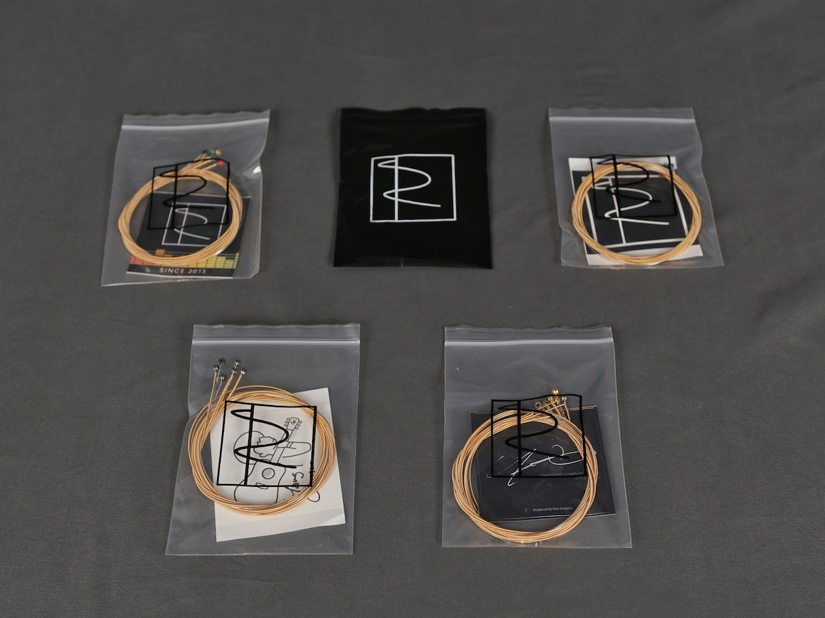 Rusi custom folk guitar string 2019 round core color head five tension three sets of SF