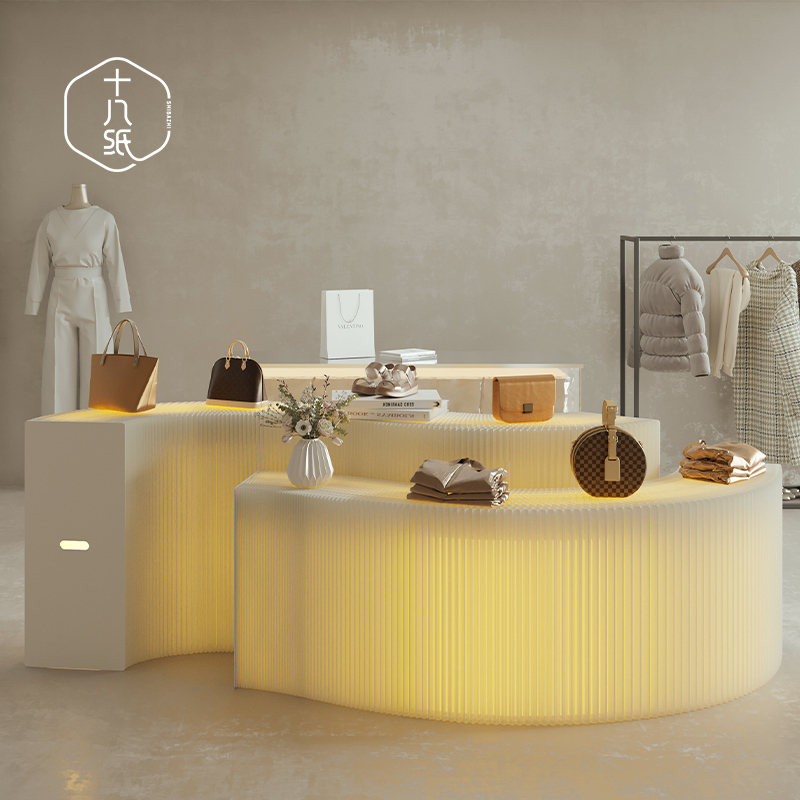 Eighteen Paper Product Display Stand with Lighted Base for Cosmetics, Illuminated Display Table for Clothing Stores and Beauty Salons Eighteen Paper Product Display Stand with Lighted Base for Cosmetics, Illuminated Display Table for Clothing Stores and Beauty Salons
