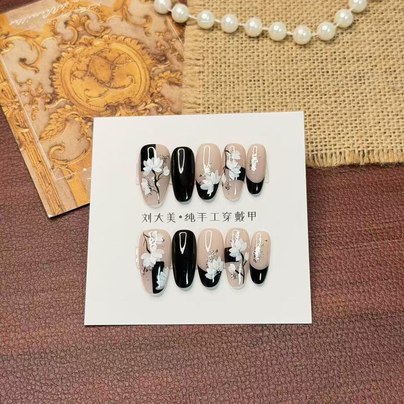 Liu Damei【Ink Orchid】Hand-Painted Exquisite Black and White Color-Blocking with White Flowers and Silver Foil to Enhance Complexion Finished Wearable Nail Art Liu Damei【Ink Orchid】Hand-Painted Exquisite Black and White Color-Blocking with White Flowers and Silver Foil to Enhance Complexion Finished Wearable Nail Art