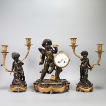 Royal Lion Castle Western antique clock. Bronze sculpture angel mantelpiece clock made in France in the 19th century.