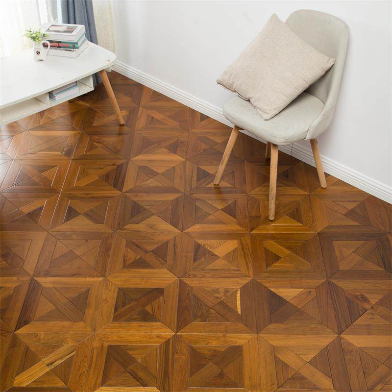 Multi - layer composite solid wood flooring household bedroom art spelling to warm Myanmar teak primary color 15mm manufacturers direct sales